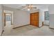Bright bedroom features neutral walls and closet space, enhanced by natural light at 1133 Turner Farms Rd, Garner, NC 27529