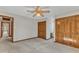 Comfortable bedroom offers a ceiling fan and spacious closets for storage solutions at 1133 Turner Farms Rd, Garner, NC 27529