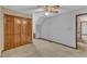 Cozy bedroom boasts a ceiling fan and large closet for ample storage space at 1133 Turner Farms Rd, Garner, NC 27529