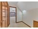 Hallway with carpet and closet shows entry to bedroom with window at 1133 Turner Farms Rd, Garner, NC 27529