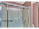 This bathroom showcases a clean shower with sliding glass doors at 1133 Turner Farms Rd, Garner, NC 27529