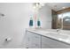 Modern bathroom with double sinks, a large mirror, and ample counter space at 1208 Garner Rd, Raleigh, NC 27610
