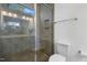 Bathroom with a glass-enclosed shower and modern fixtures at 1208 Garner Rd, Raleigh, NC 27610