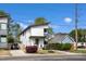 Modern two-story home boasts clean lines, a well-maintained front yard, and inviting curb appeal at 1208 Garner Rd, Raleigh, NC 27610
