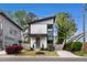 Striking modern home with two stories, eye-catching curb appeal, and manicured landscaping at 1208 Garner Rd, Raleigh, NC 27610