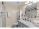 This is a modern bathroom with a marble countertop and updated fixtures at 1210 Ventura Springs Ct, Wake Forest, NC 27587