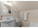 A bathroom featuring a sink, a mirror, and a toilet creating a functional and accessible space at 1210 Ventura Springs Ct, Wake Forest, NC 27587
