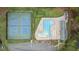Overhead aerial view of community pool, tennis courts, clubhouse and parking lot for residents at 1210 Ventura Springs Ct, Wake Forest, NC 27587