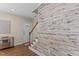 View of the Foyer showing wood-look floors and decorative wood accent wall at 1210 Ventura Springs Ct, Wake Forest, NC 27587