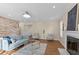 Spacious living area with a fireplace and stylish wood-look flooring at 1210 Ventura Springs Ct, Wake Forest, NC 27587