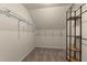A walk-in closet featuring multiple shelves and hanging rods provides lots of storage options at 1210 Ventura Springs Ct, Wake Forest, NC 27587