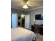 Bedroom with walk-in closet, ceiling fan and neutral tones at 126 W Quail Ridge Rd, Oxford, NC 27565
