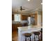 Kitchen featuring granite countertops, stainless steel appliances, and an island with seating at 126 W Quail Ridge Rd, Oxford, NC 27565
