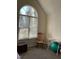 Bright office area featuring a vaulted ceiling, a large window, and neutral carpeting at 126 W Quail Ridge Rd, Oxford, NC 27565