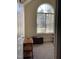 Bright office area featuring a vaulted ceiling, a large window, and neutral carpeting at 126 W Quail Ridge Rd, Oxford, NC 27565