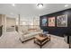 Open basement area with sofa and lofted landing at 1524 Catch Fly Ln, Durham, NC 27713