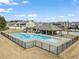 Community pool with shaded seating area, perfect for outdoor fun at 1524 Catch Fly Ln, Durham, NC 27713