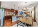 Open-concept kitchen and dining area with a large island, perfect for entertaining and Gathering gatherings at 1524 Catch Fly Ln, Durham, NC 27713