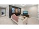 Comfortable living room with modern decor, including movie posters, a sofa, and a TV at 1524 Catch Fly Ln, Durham, NC 27713
