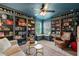 Cozy living room boasts built-in bookshelves, natural light, and comfortable seating at 1524 Catch Fly Ln, Durham, NC 27713
