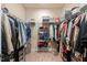 Spacious walk-in closet featuring ample clothing storage and wire shelving at 1524 Catch Fly Ln, Durham, NC 27713