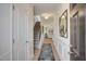 Inviting entryway features hardwood floors, wainscoting, and stylish decor at 160 Bruce Dr, Dunn, NC 28334