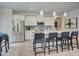 Modern kitchen with white cabinets, stainless steel appliances, and a center island at 160 Bruce Dr, Dunn, NC 28334