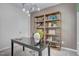 Cozy home office space with neutral color scheme and open shelving at 160 Bruce Dr, Dunn, NC 28334