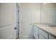 Bathroom vanity featuring granite countertops and white cabinetry, creating a clean and modern space at 185 W Amber Oak Dr, Selma, NC 27576