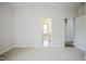 Spacious bedroom featuring a standard closet and an open door to the ensuite bathroom at 185 W Amber Oak Dr, Selma, NC 27576