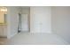 Bedroom view showing standard closet and ensuite bathroom at 185 W Amber Oak Dr, Selma, NC 27576