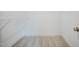 Walk-in closet with carpet flooring and wire shelving at 185 W Amber Oak Dr, Selma, NC 27576