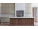 Stylish kitchen with a center island, white countertops, custom tile work, and modern fixtures at 186 Evington Dr, Pittsboro, NC 27312