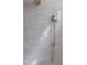 Modern shower featuring sleek gray subway tiles and a brushed nickel shower head at 186 Evington Dr, Pittsboro, NC 27312