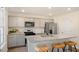 Modern kitchen with stainless steel appliances and spacious island at 201 Olive Branch St, Sanford, NC 27332