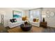 Cozy living room featuring a comfortable sectional sofa and elegant decor at 201 Olive Branch St, Sanford, NC 27332