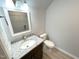 Modern half-bathroom features granite countertops and stylish vanity at 204 Allen St # A/B, Creedmoor, NC 27522