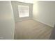 Bright bedroom features neutral paint and plush carpet at 204 Allen St # A/B, Creedmoor, NC 27522