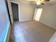 Bright bedroom features plush carpet, ample natural light, and a spacious walk-in closet at 204 Allen St # A/B, Creedmoor, NC 27522