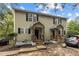 Charming two-story home featuring a quaint front porch and neatly maintained landscaping and dark shutters at 204 Allen St # A/B, Creedmoor, NC 27522