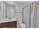 Bathroom with vanity, toilet, and shower at 208 Tarkenton Ct, Clayton, NC 27527