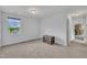 Bright bedroom with carpeting and a steamer trunk at 208 Tarkenton Ct, Clayton, NC 27527