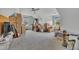 Bright bonus room with carpeted floors, ceiling fan, and natural light at 208 Tarkenton Ct, Clayton, NC 27527