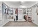 A large walk-in closet featuring custom shelving and ample storage space at 208 Tarkenton Ct, Clayton, NC 27527