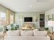 Inviting living room featuring a comfortable sofa, cozy chairs, and tasteful decor at 2118 Cherry Creek Rd, Haw River, NC 27258