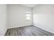 Cozy bedroom featuring a window that lets in sunlight at 2130 Cherry Creek Rd, Haw River, NC 27258