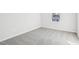 Light-filled bedroom with gray carpet and one window offering natural light at 2130 Cherry Creek Rd, Haw River, NC 27258