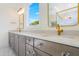 Modern bathroom with double vanity and bright windows at 216 Meadow Walk Dr, Fuquay Varina, NC 27526