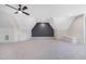 Open bonus room with neutral carpet, recessed lights, and black accent wall at 216 Meadow Walk Dr, Fuquay Varina, NC 27526
