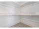 Spacious walk-in closet with wood closet poles at 216 Meadow Walk Dr, Fuquay Varina, NC 27526